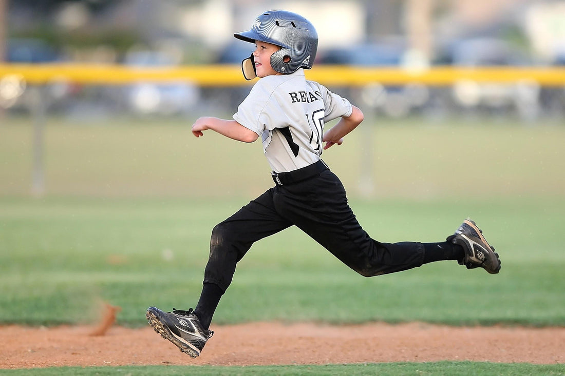 young boy playing baseball
